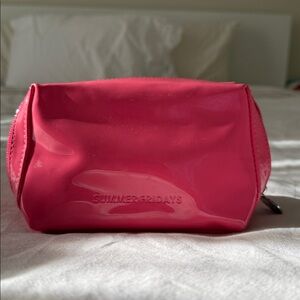 Summer Fridays glossy pouch in pink guava